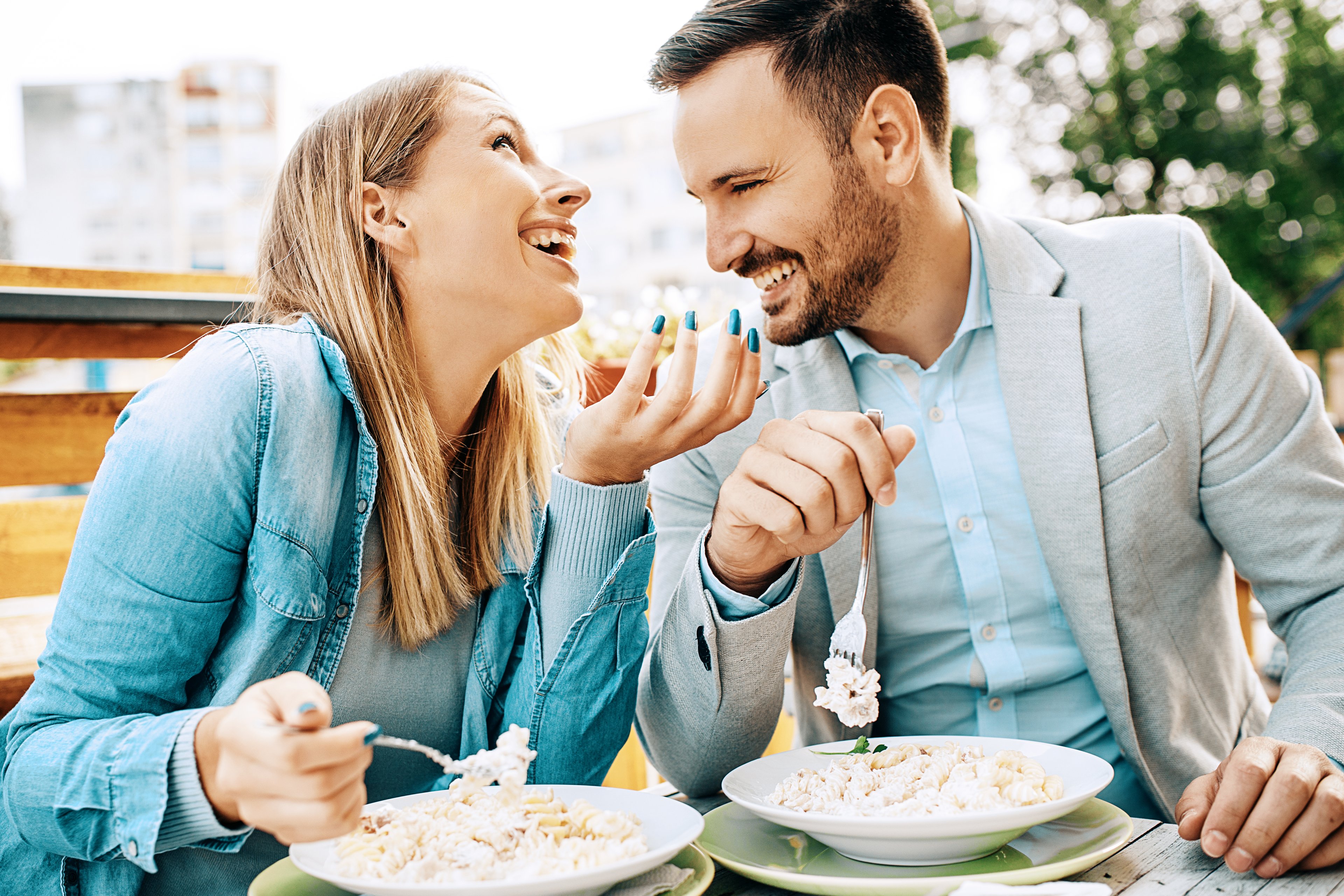 Couple enjoying a nice restaurant meal.