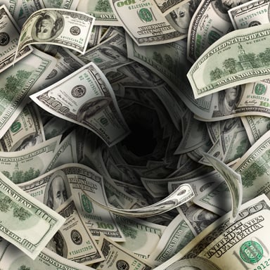 Money falling down a black hole.