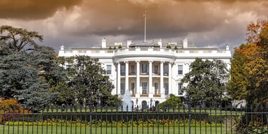 White House with storm clouds