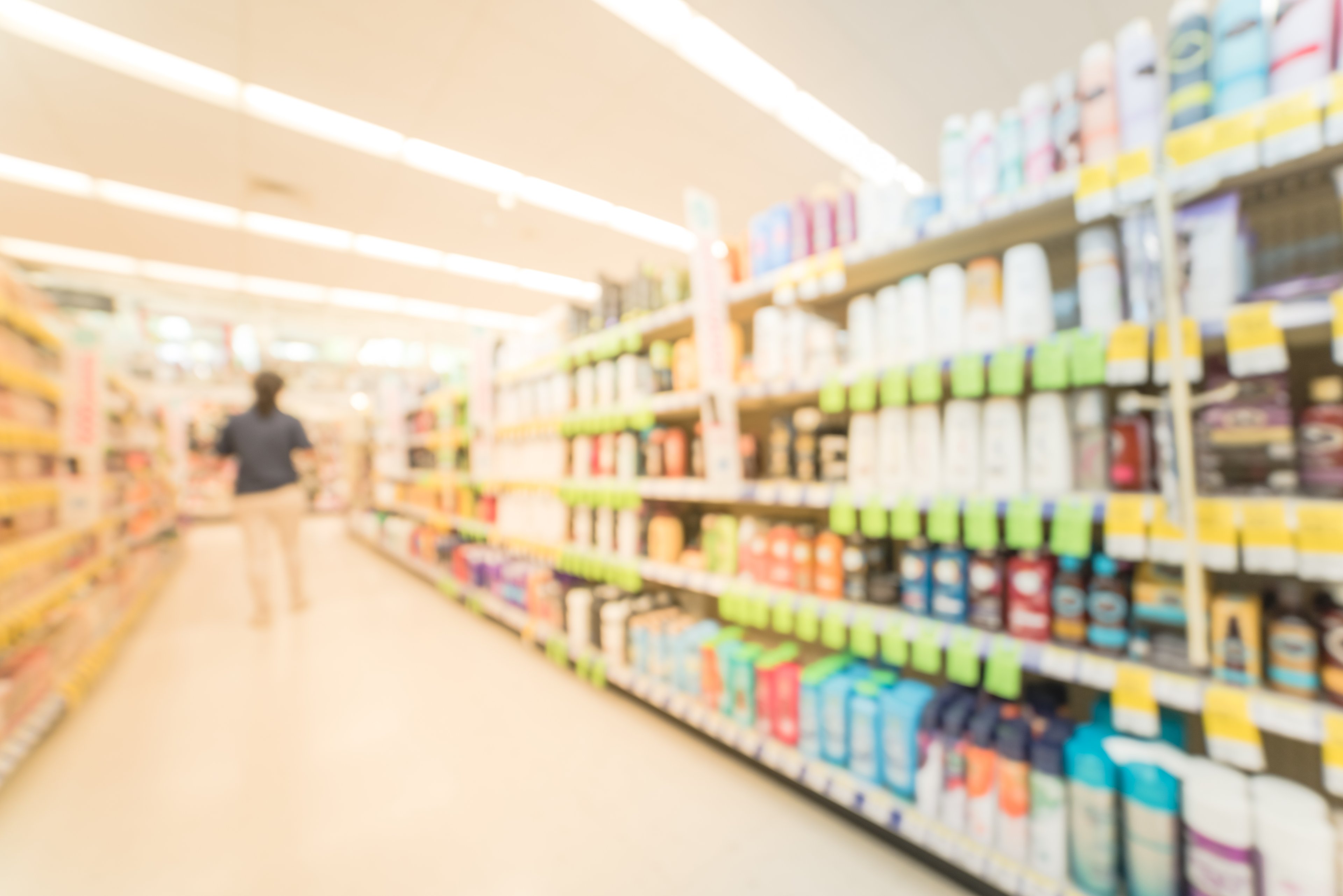 Person shopping in a store aisle. 