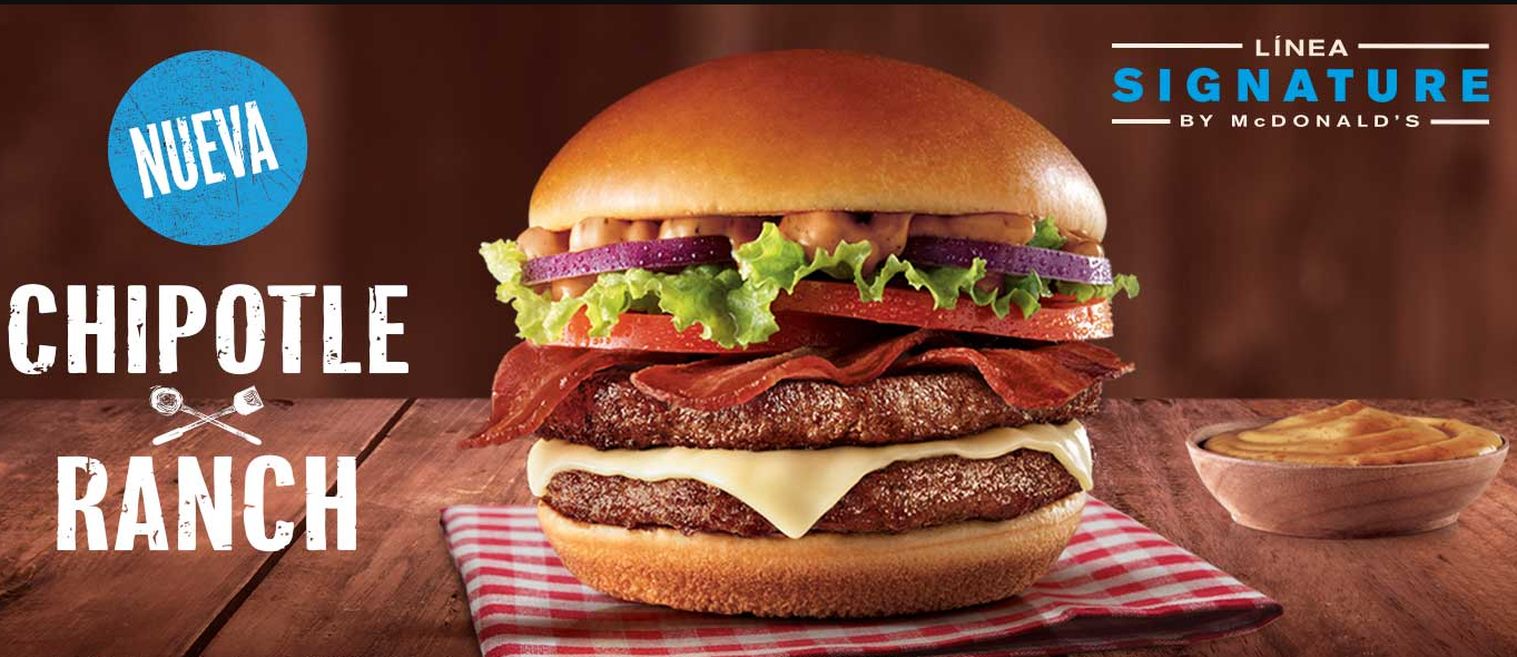 Advertisement showing a hamburger with artisan toppings.
