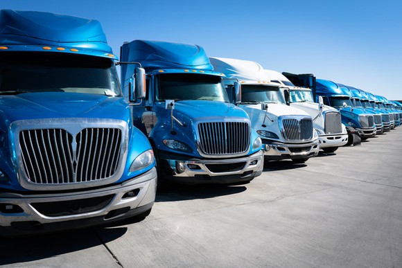 A lineup of heavy-duty trucks.