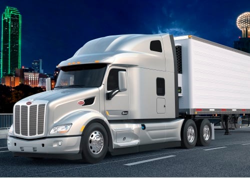 Commercial semi-truck hauling a load.