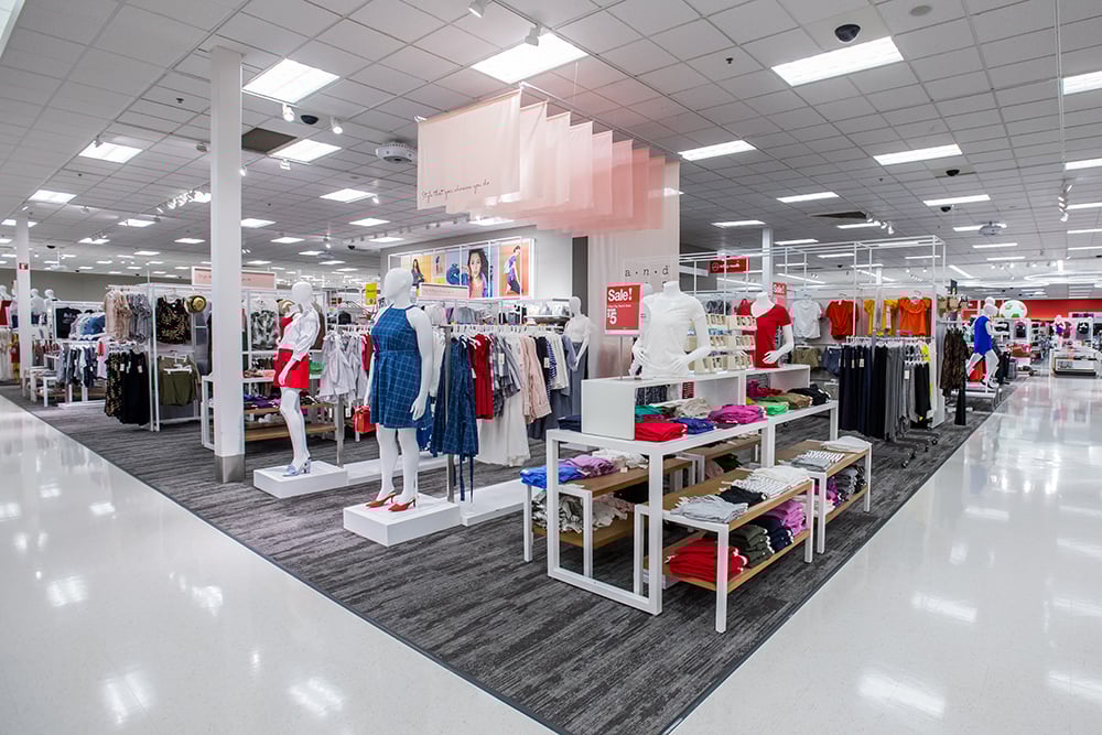 The interior of a Target store, with children's clothing on display.