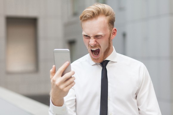 Man yelling at cellphone