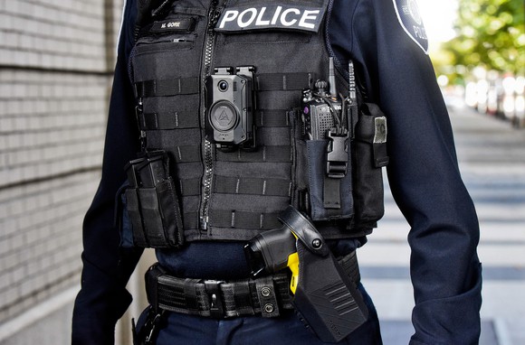 Officer wearing Axon Body 3 and Taser 7 products. 