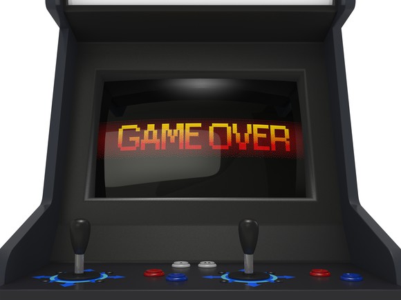 Arcade console displaying "GAME OVER"