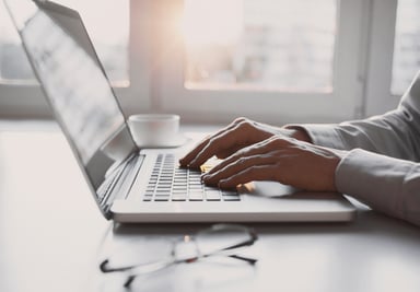 man typing on laptop_GettyImages-621613860