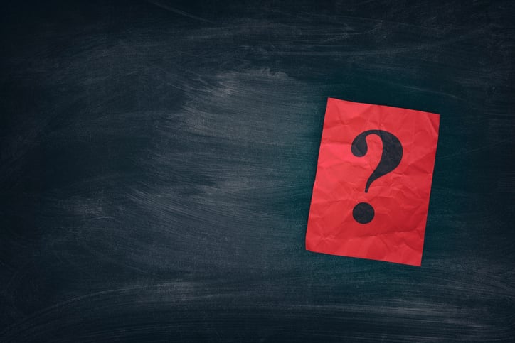 025 question mark on table