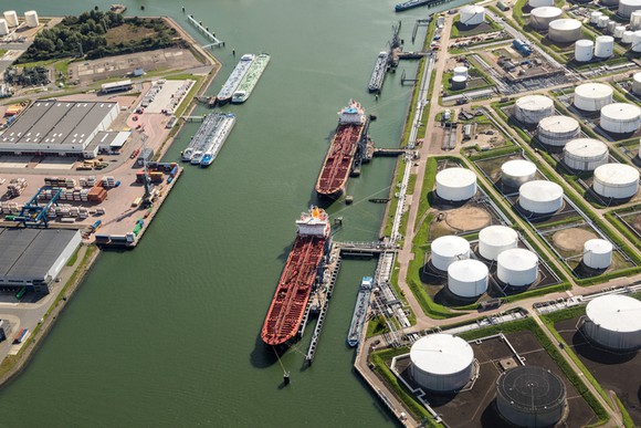 An aerial view of tankers at port.