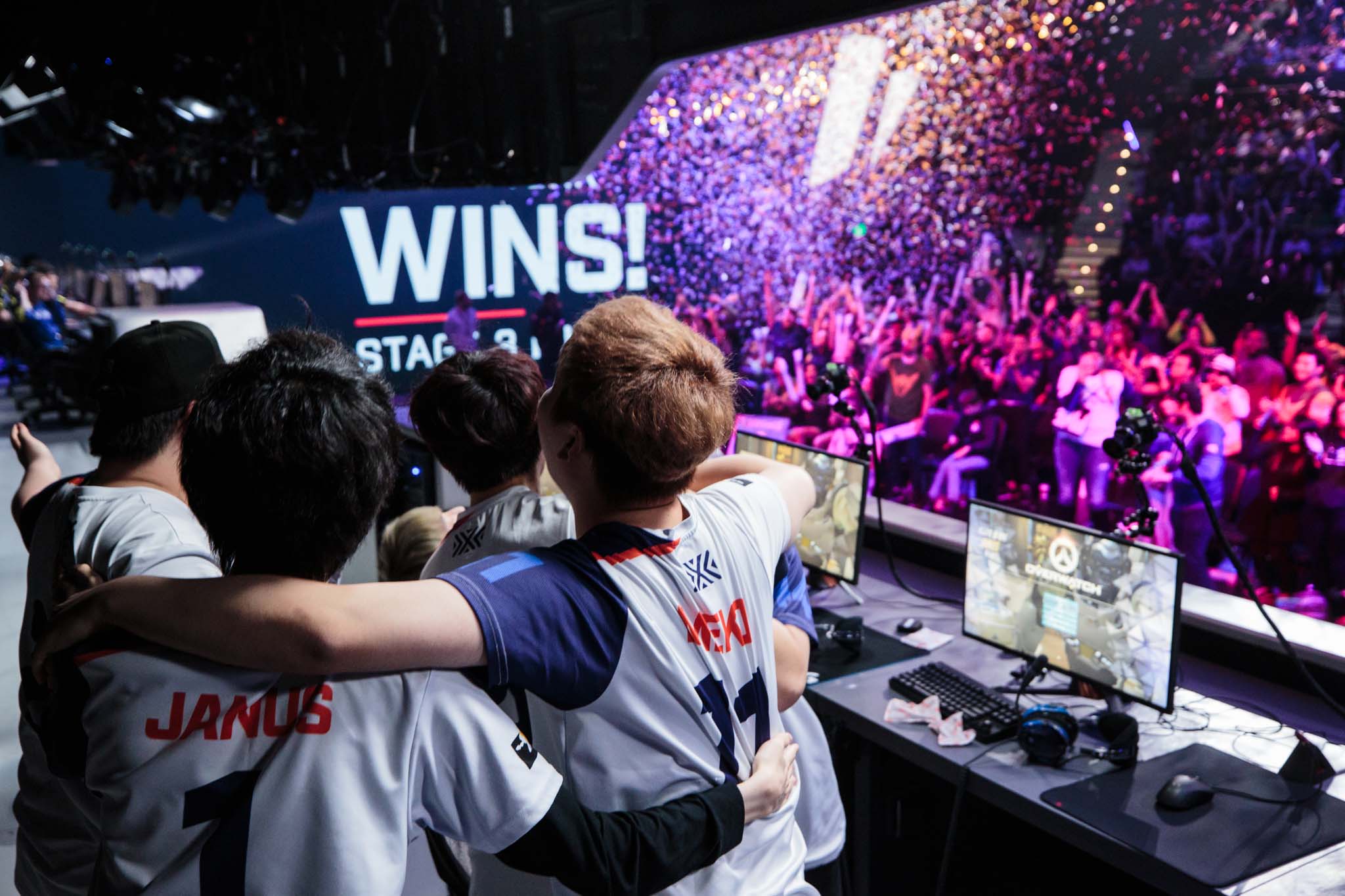 Members of Overwatch League's New York Excelsior team celebrating a win.