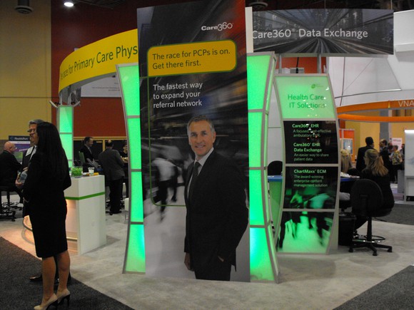 Conference booth featuring Care360 materials.