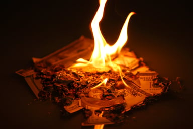 burning money getty
