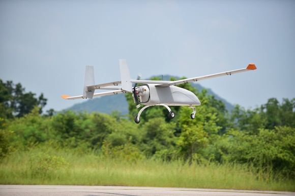 A military-style drone in flight