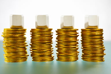 4 stacks of gold coins