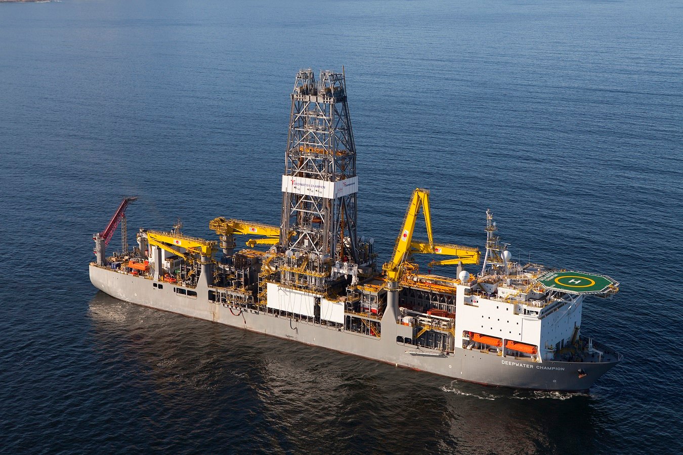 Drillship at sea with the Transocean logo on it.