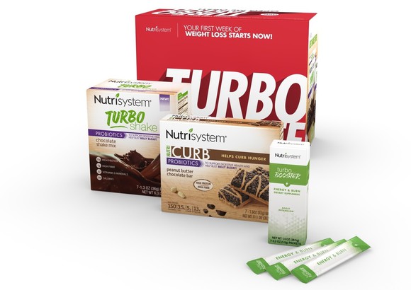 Several boxes of Nutrisystem Turbo and Curb brand products.