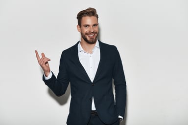 smiling man in suit_GettyImages-907996318