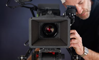 Cameraman working with a movie camera