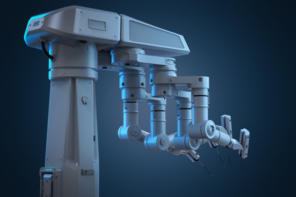 3-D rendering of a robot surgery machine with four arms.