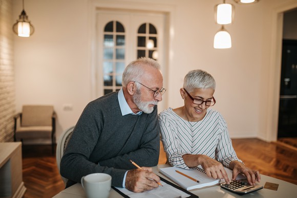 Retired couple looking at finances.