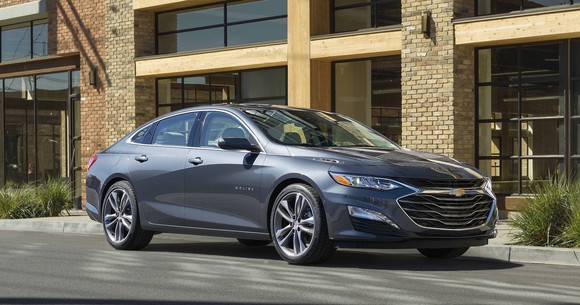 A silver Chevrolet Malibu, a midsize sedan.