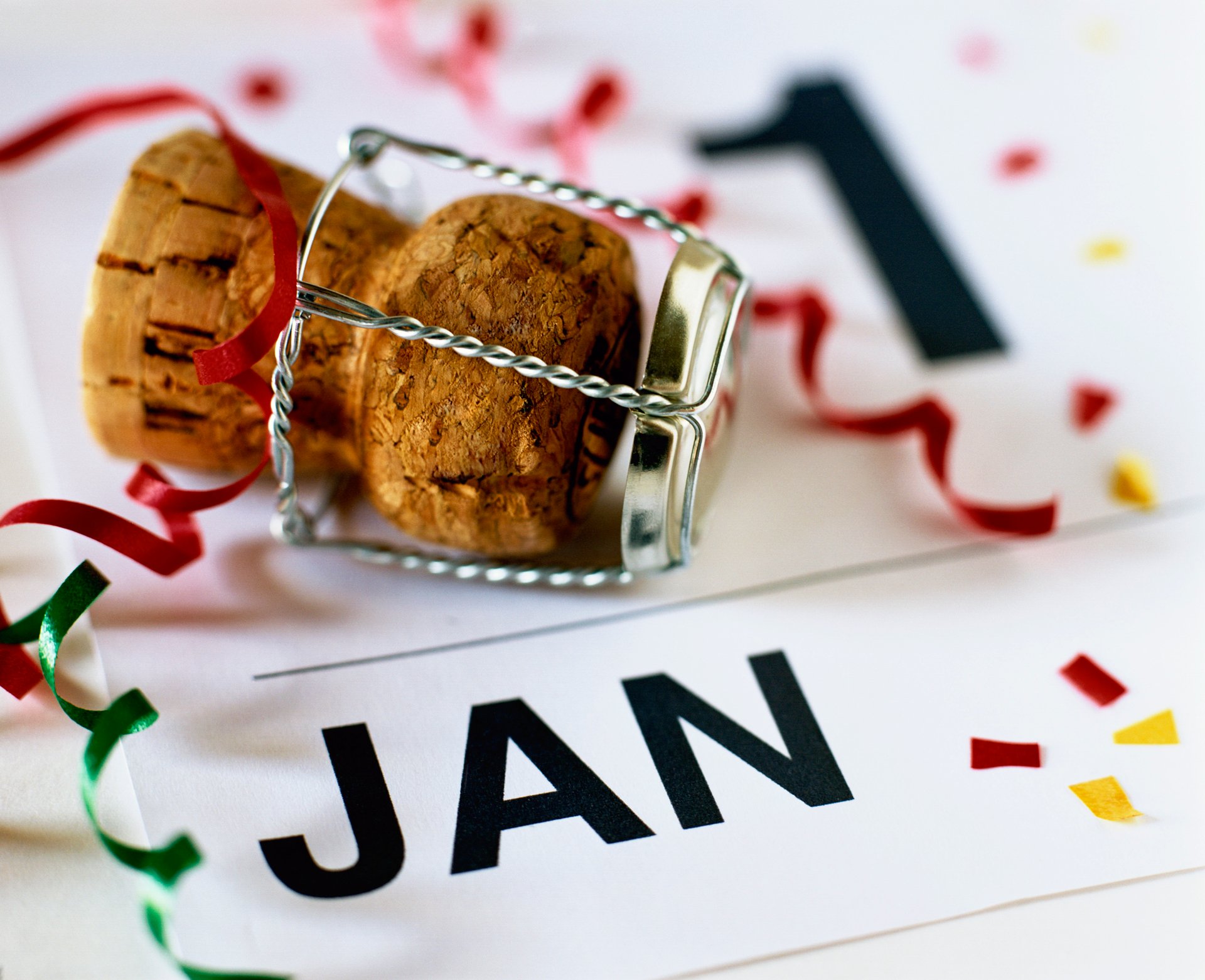 Champagne cork on top of a calendar showing January 1