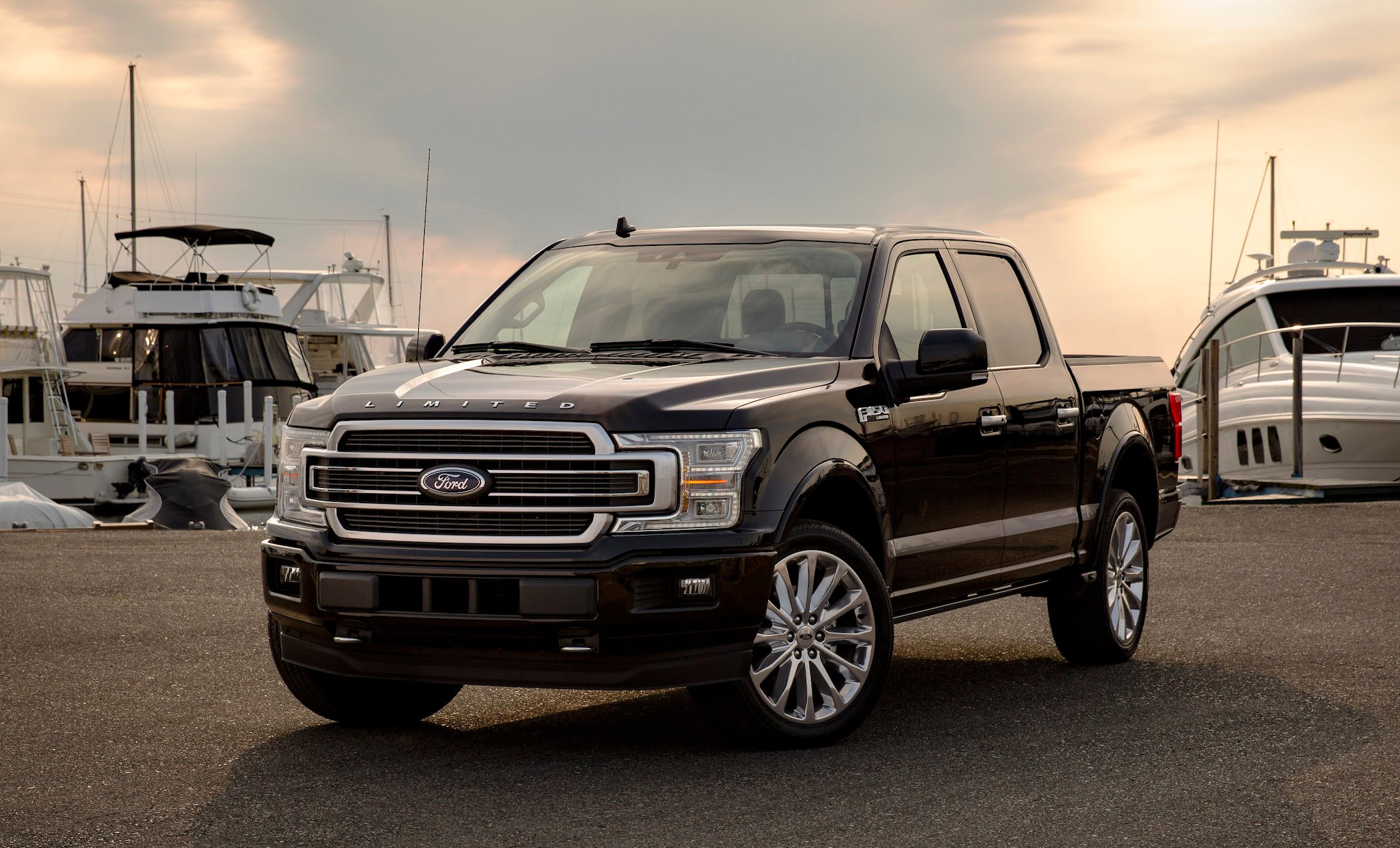 A 2019 Ford F-150 Limited, an upscale full-size pickup truck, parked at a marina.