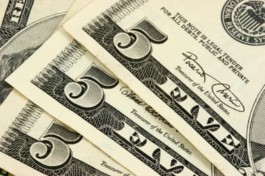 Three five dollar bills