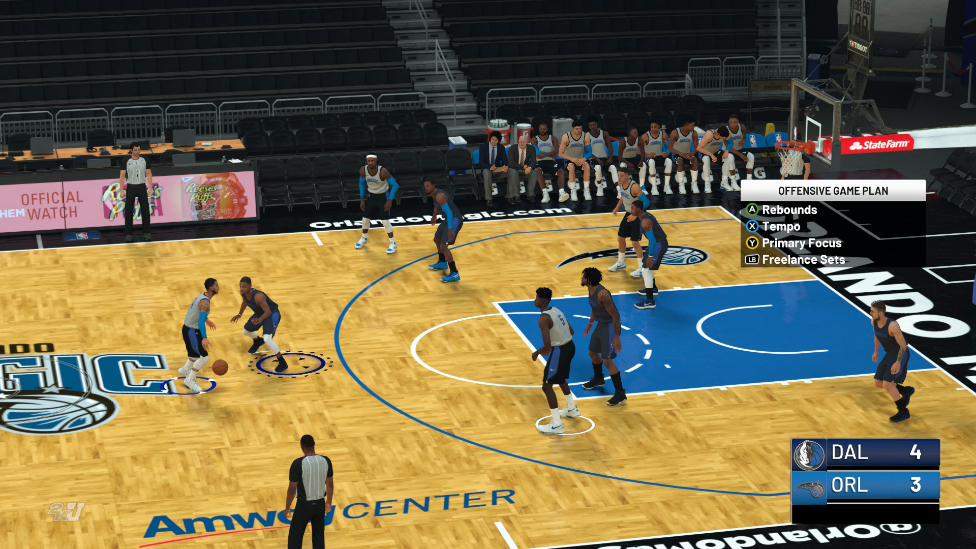 A screenshot of game play from NBA 2K19, showing virtual players on a basketball court. 