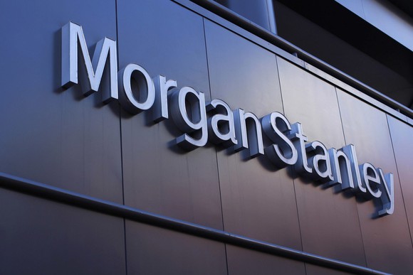 Morgan Stanley logo on a paneled wall background.