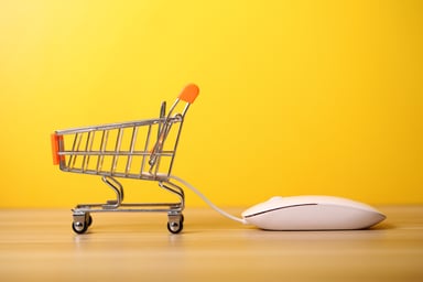 A shopping basket connected to a computer mouse
