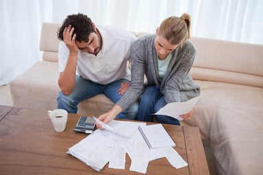 couple reviewing bills_GettyImages-137306532