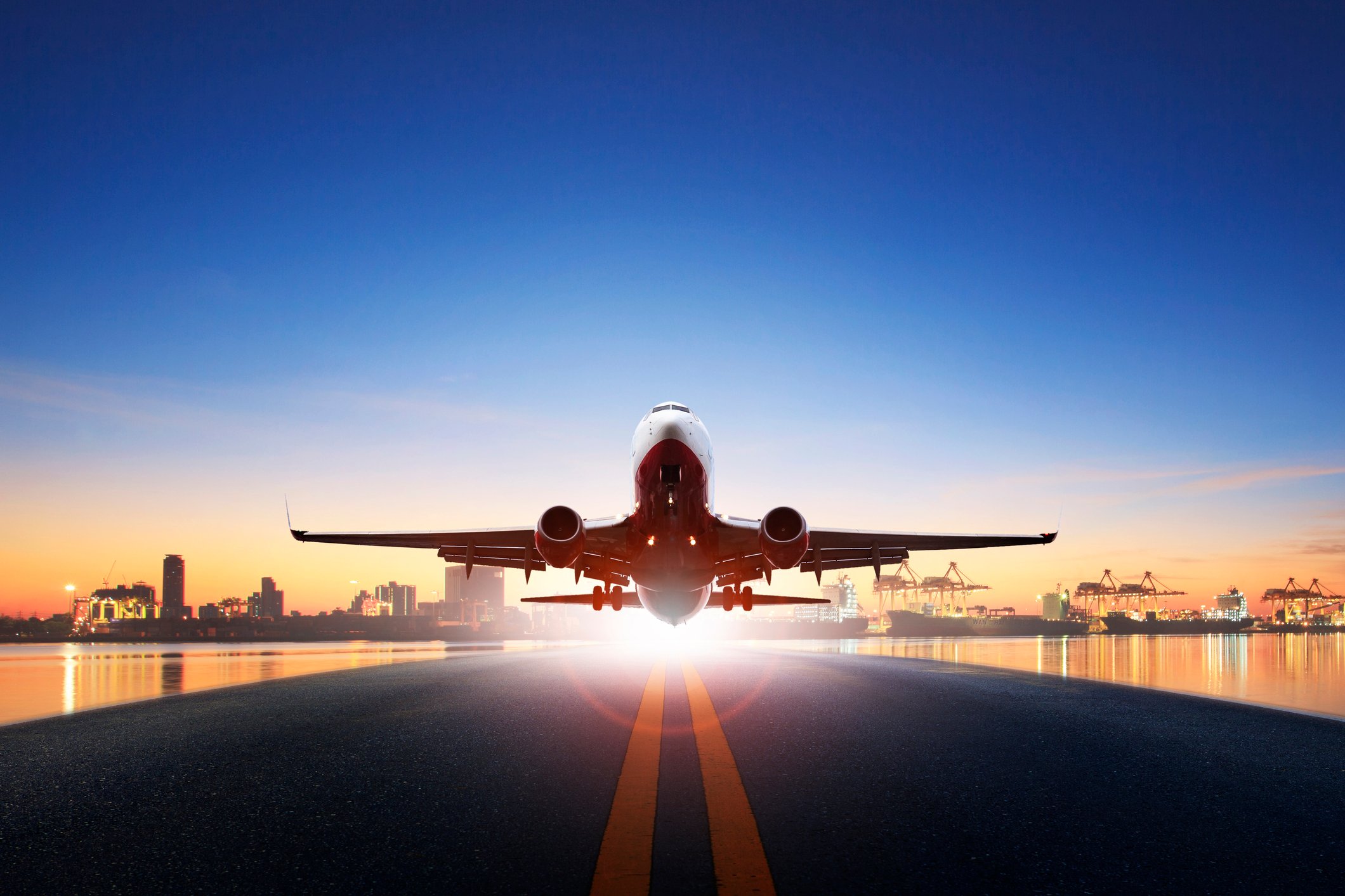 Cargo airplane taking off from runway