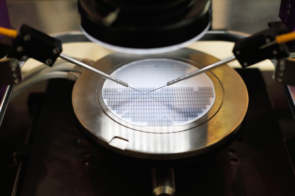 An image of a silicon wafer undergoing probe testing