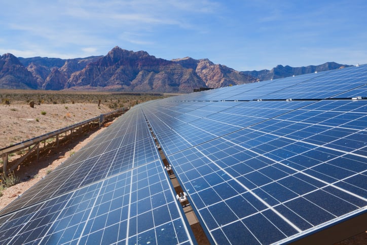 A utility-scale solar power plant in the desert.