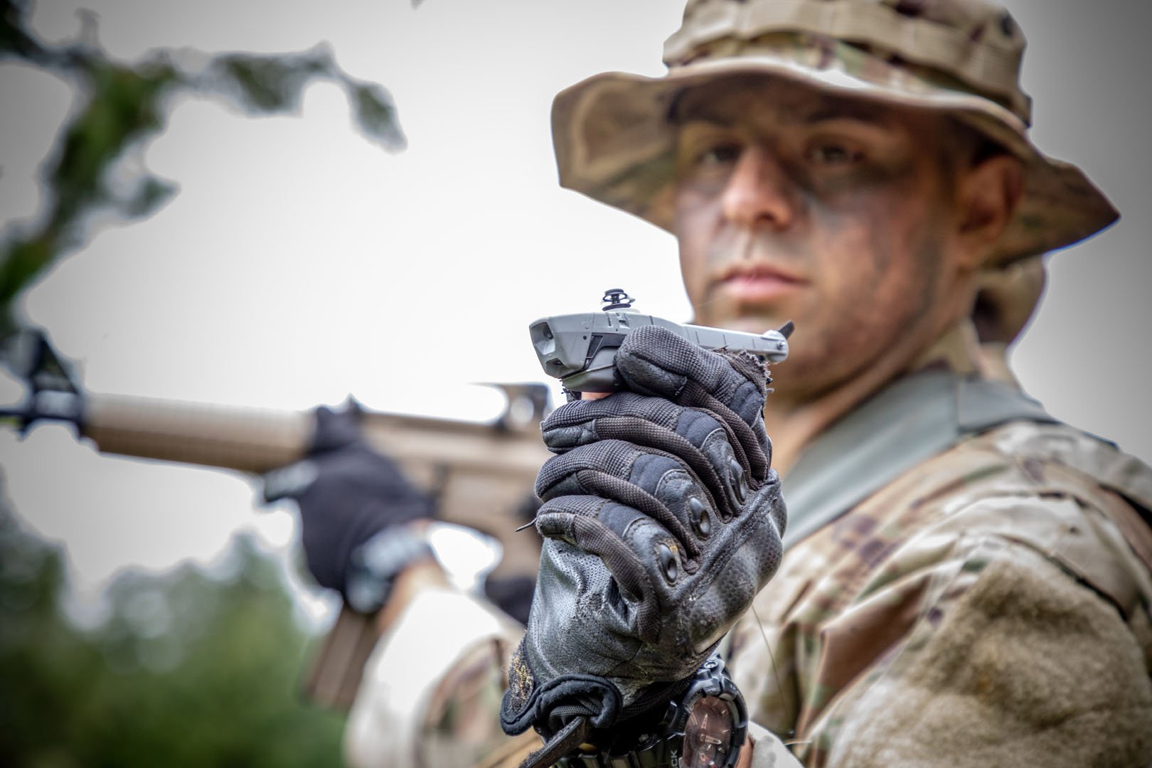 Soldier holding small Black Hornet UAV