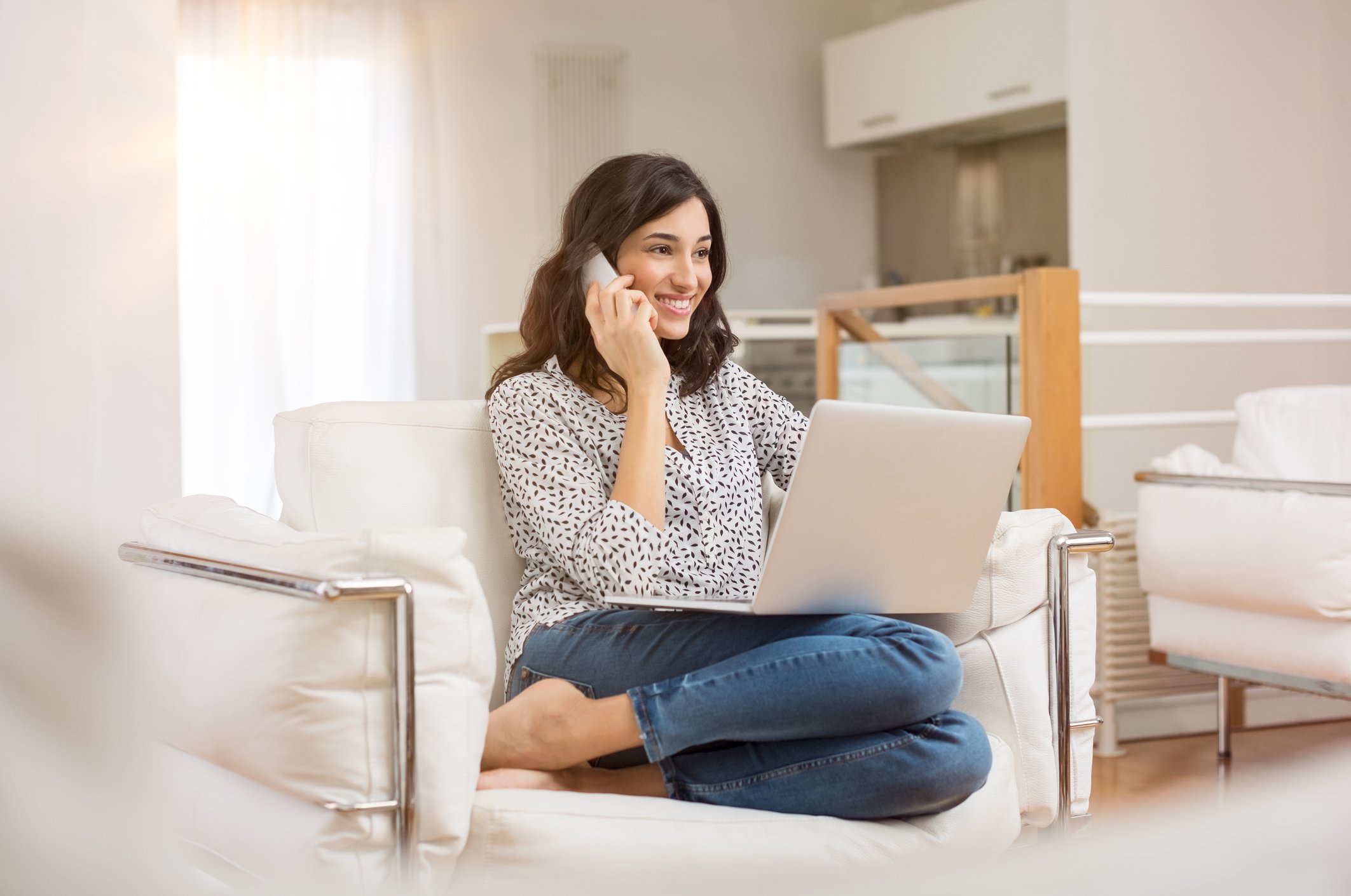 A woman speaks on the phone