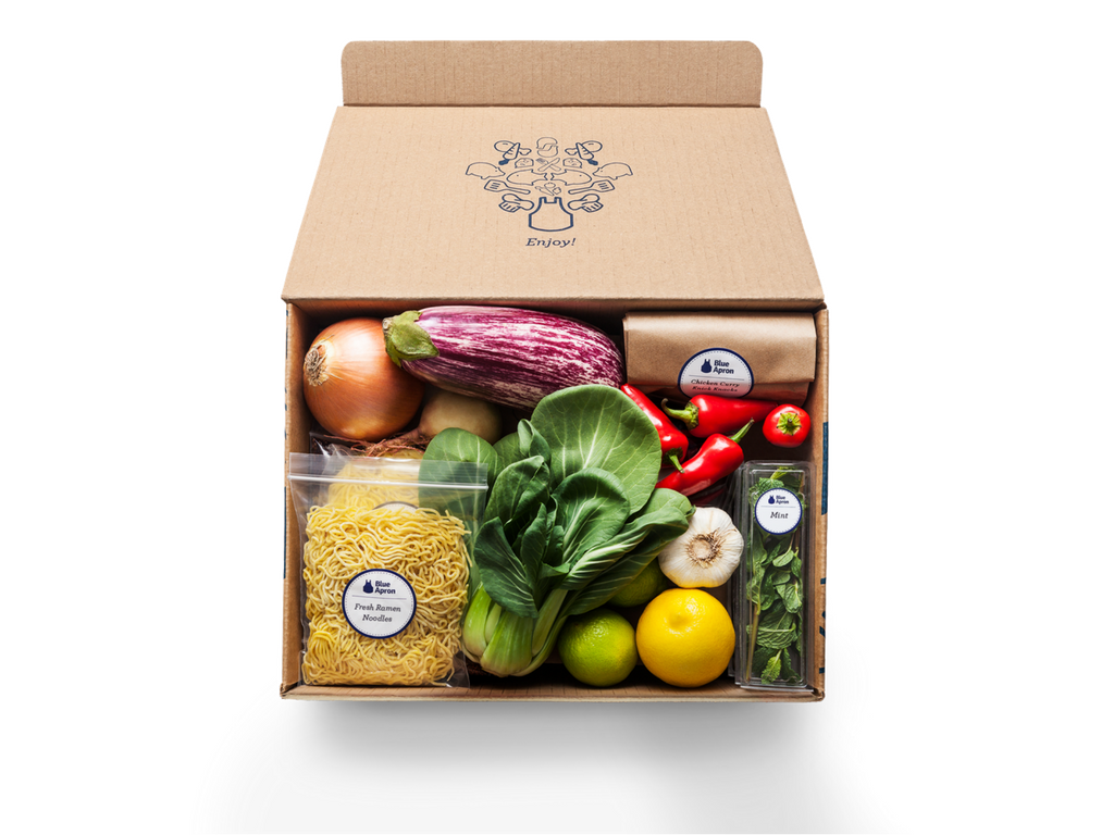 A box of vegetables and noodles from Blue Apron.