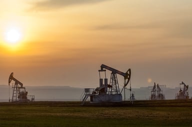 Oil pumps on a foggy morning.