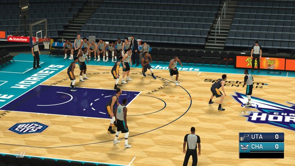 A screenshot of game play in NBA 2K19 with players on a basketball court. 