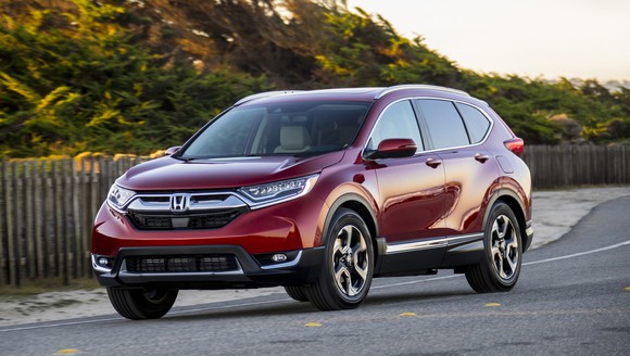 A red 2018 Honda CR-V, a compact crossover SUV