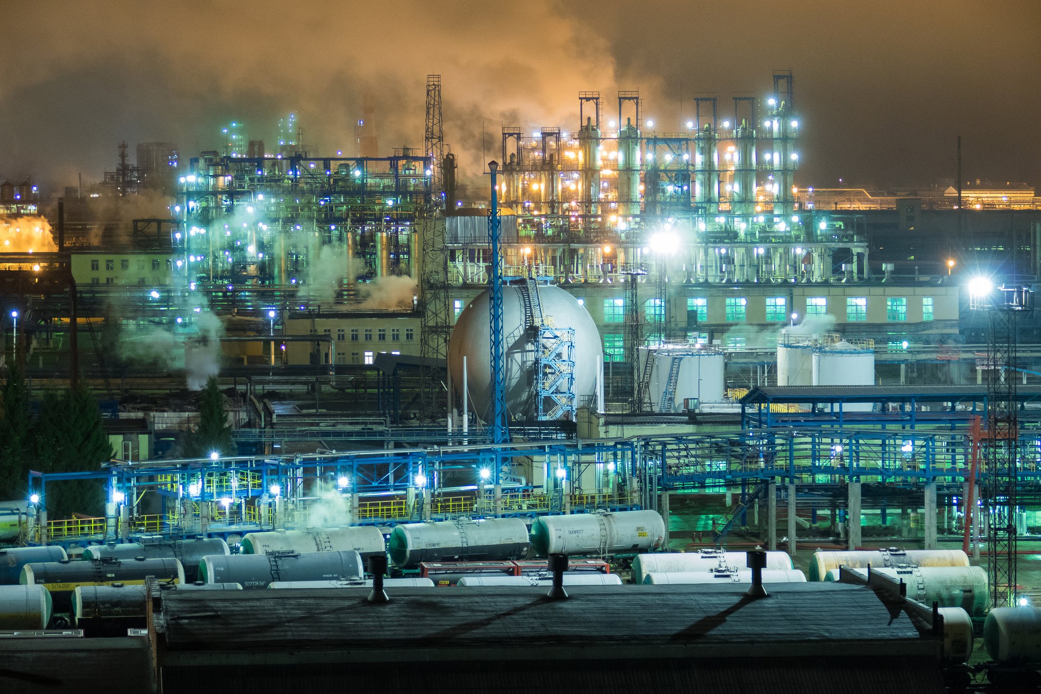 An oil refinery lit up at night.