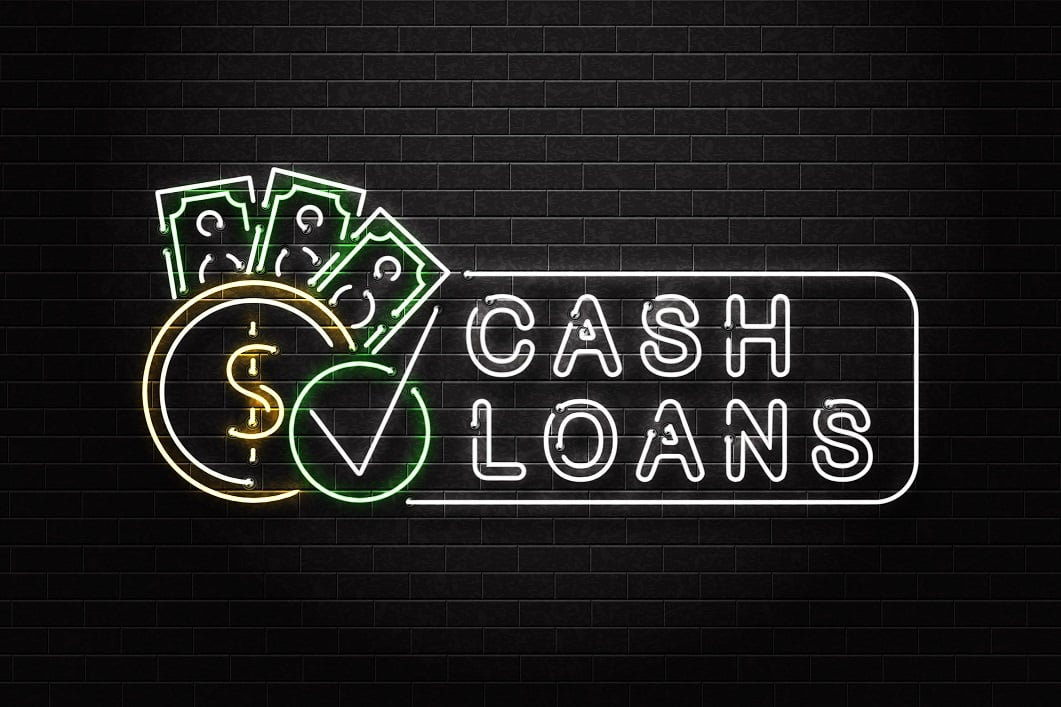 Neon sign that reads "Cash Loans."