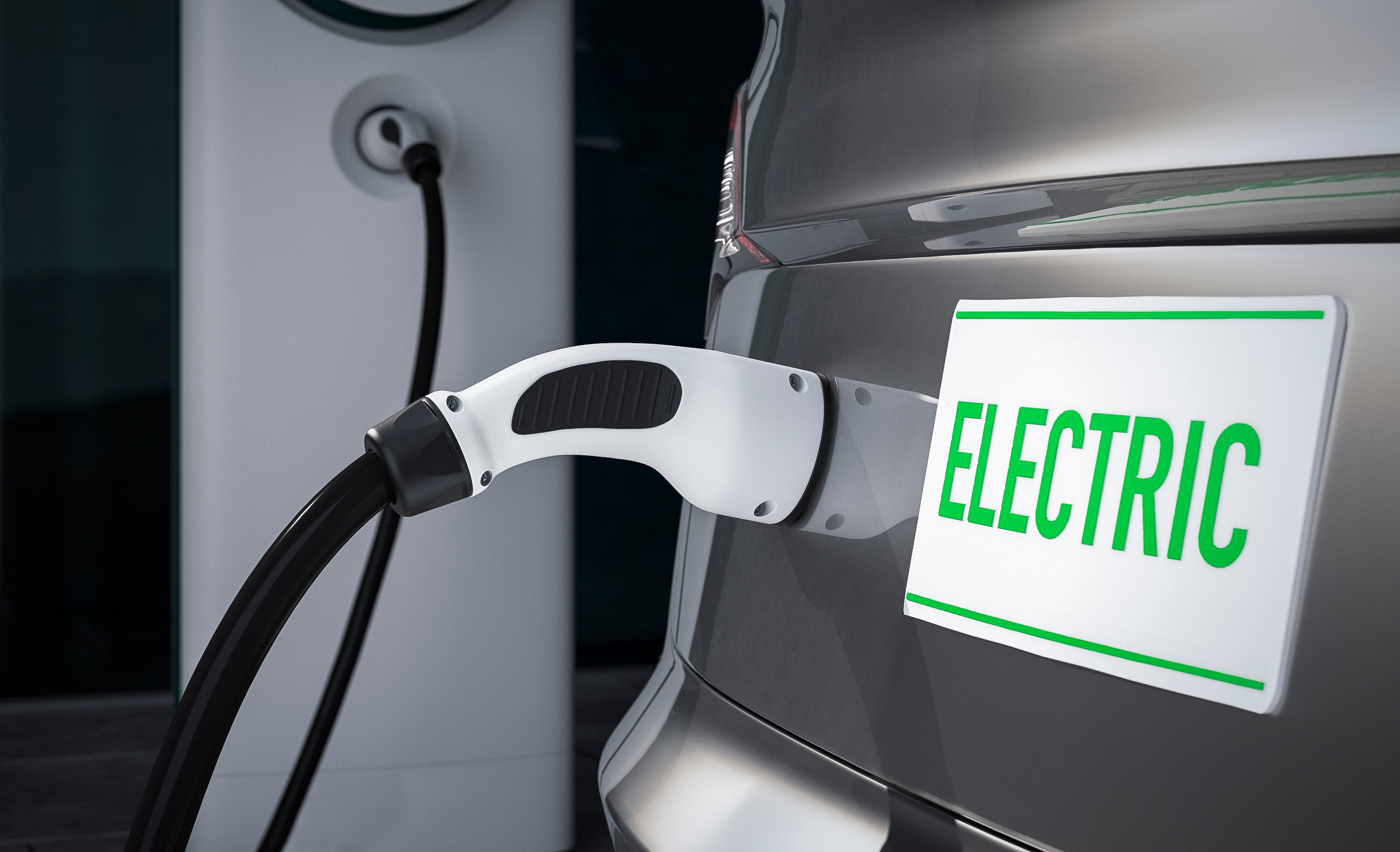 A vehicle being electrically charged.