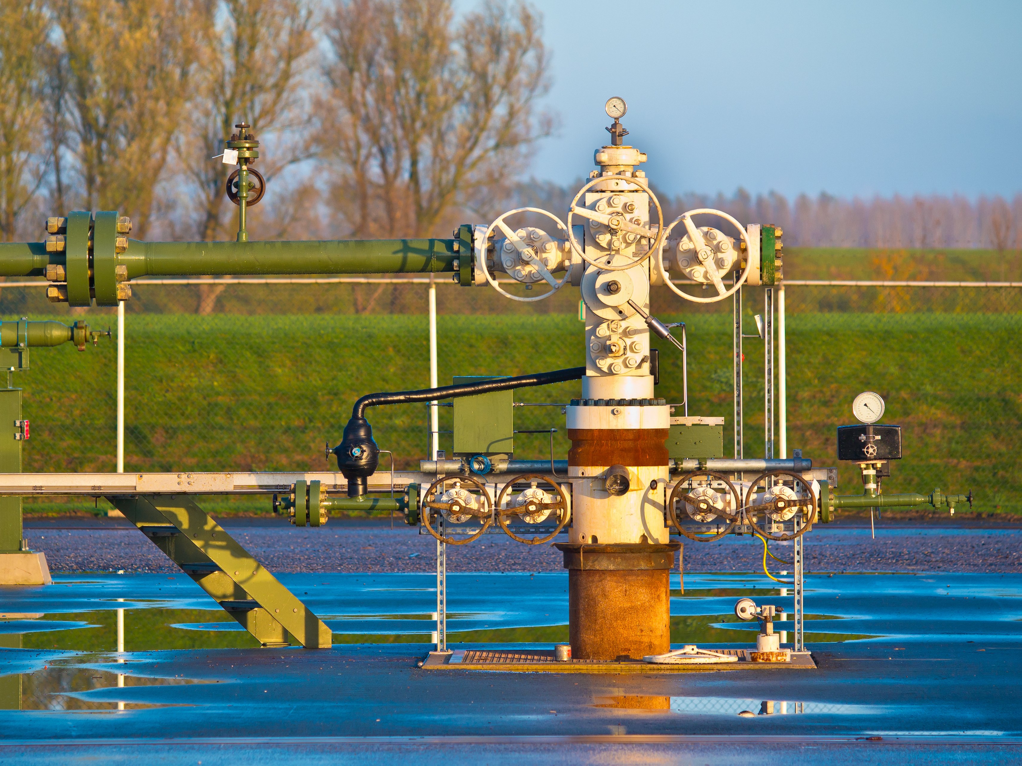 A natural gas wellhead after a rainy day.