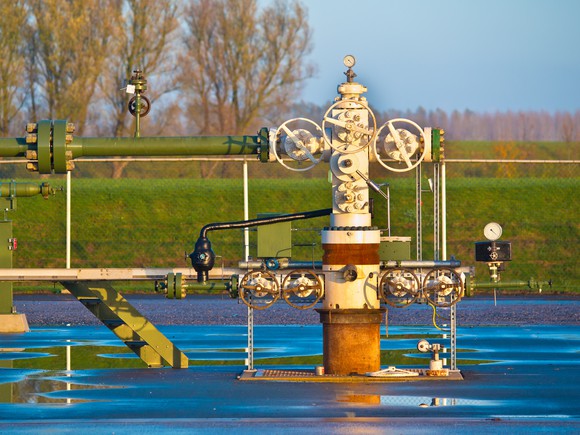 A natural gas wellhead after a rainy day.