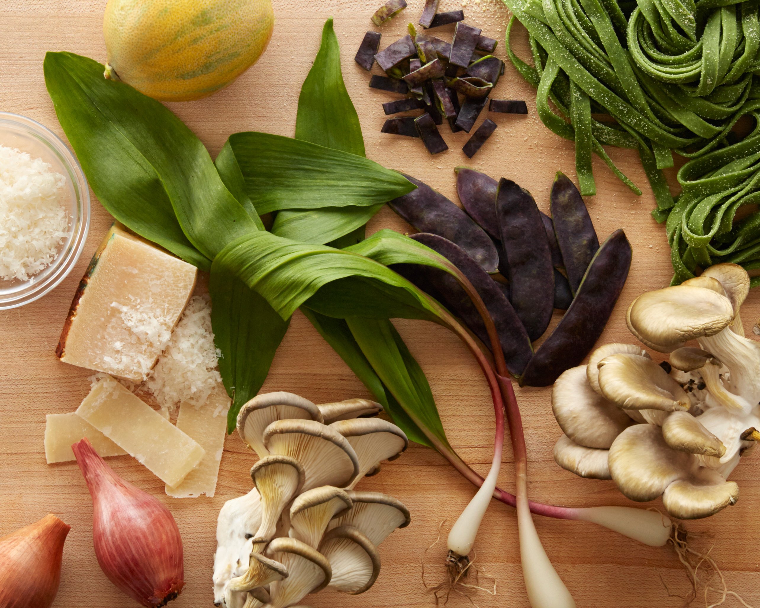Various ingredients laid out on a wood table