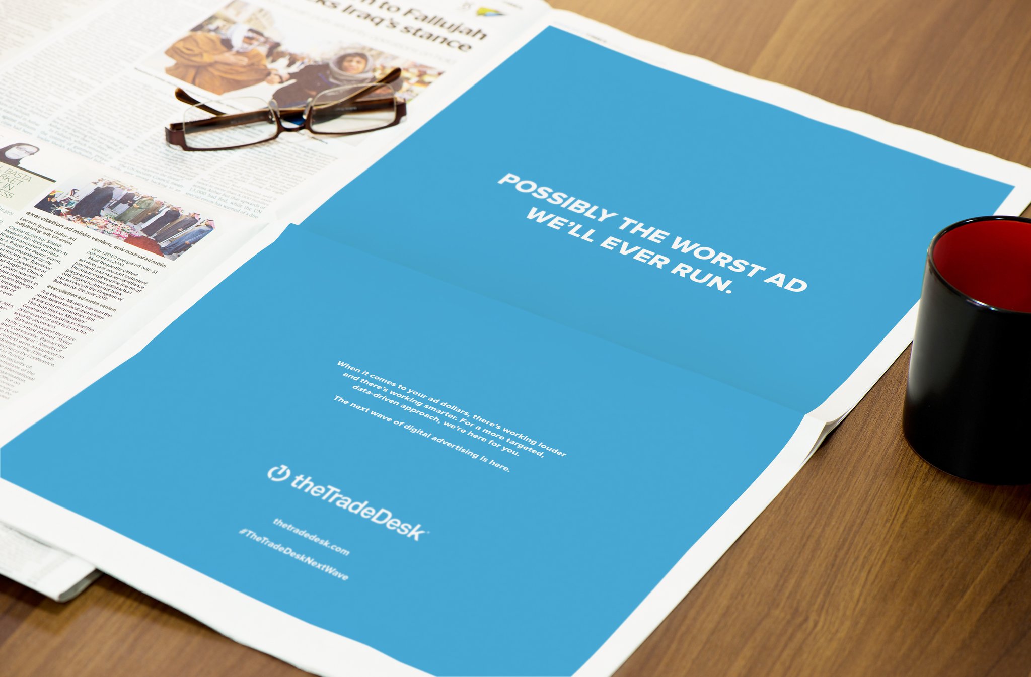 The Trade Desk ad in a newspaper reads, possibly the worst ad we'll ever run