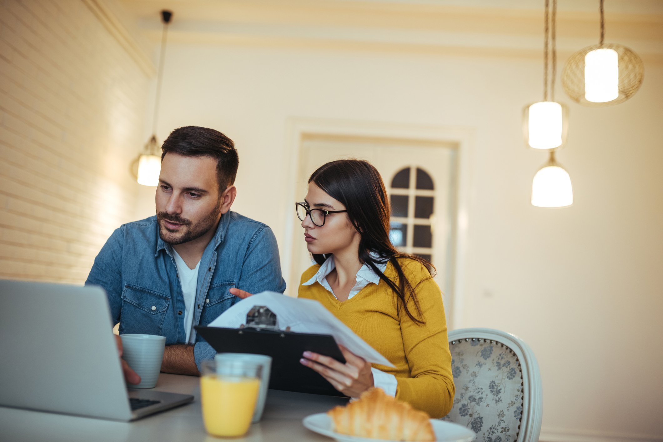 Young couple at laptop.